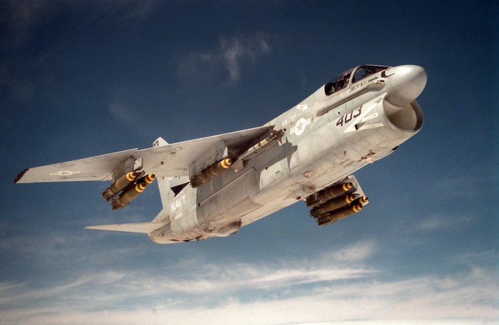 A fighter jet is launched from an aircraft carrier